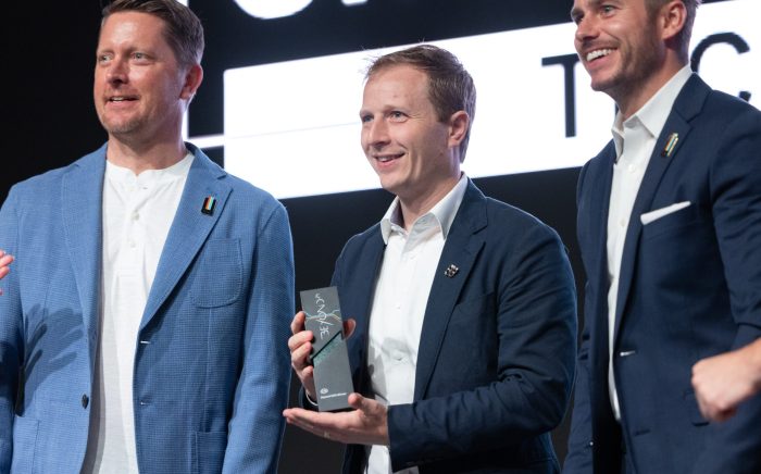 On Line Support accepting Social Impact Award