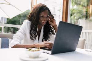 Business woman working on a computer protected by managed IT